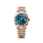 Replica Rolex Day-Date 128235 Rose Gold Blue-Green Baguette Marker Dial